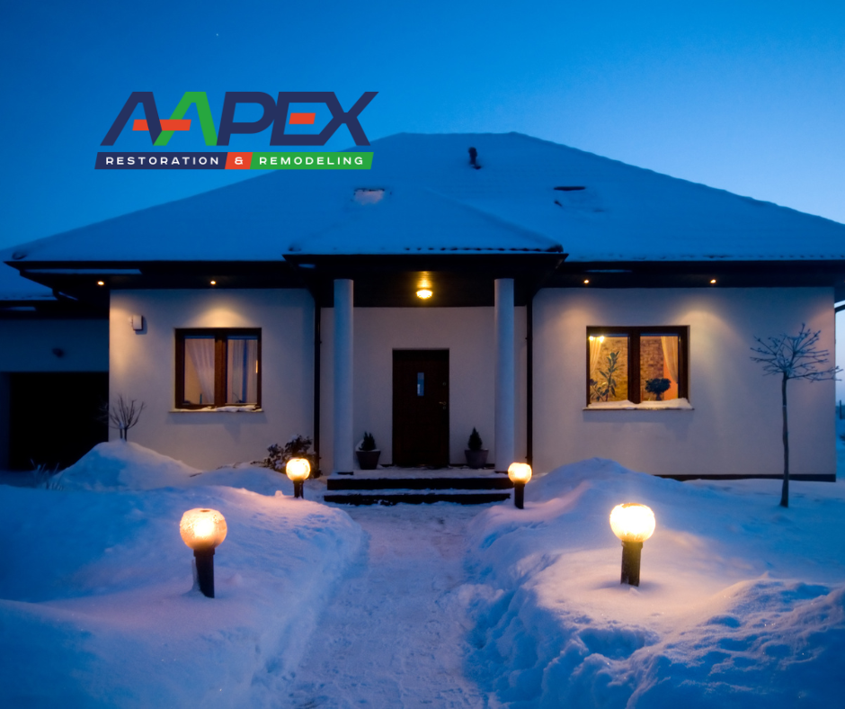 Snowy house with exterior lighting tactics employed. Aapex logo top left.